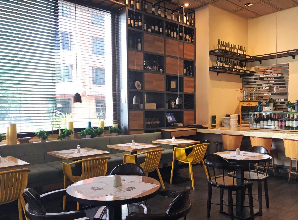 Hotel 100 Luxury Suites By Preferred Bogotá Exterior foto Interior of a restaurant in the United States