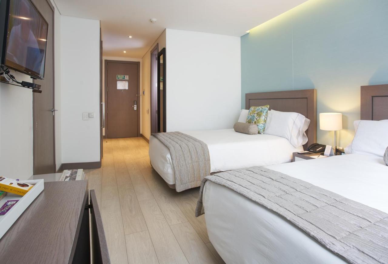Hotel 100 Luxury Suites By Preferred Bogotá Exterior foto A room at the hotel